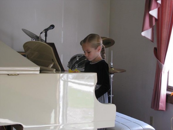 Whitney (Daryl's) is learning to play the piano, so she enjoyed practicing a little while the guys cleaned up.