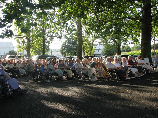 The parking lot was full of chairs--the nearby field was full of cars.