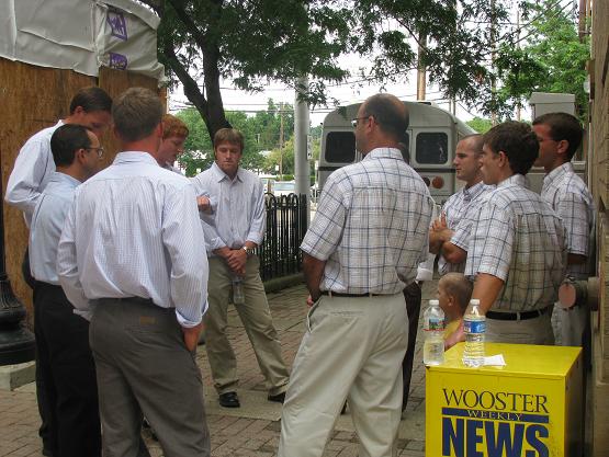 Praying with Higher Ground and Davy Richards before the service